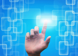 hand pushing button on a touch screen interface