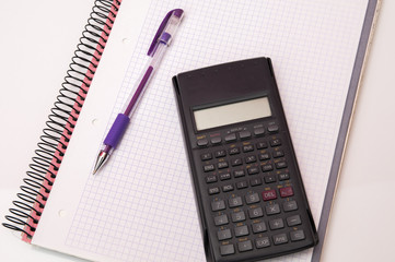 calculator notebook with notes