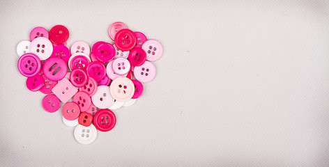 Fototapeta premium Pink buttons in shape of heart