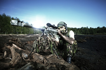 Special forces soldier with sniper rifle barrett m99