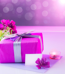 Pink present with flowers bouquet