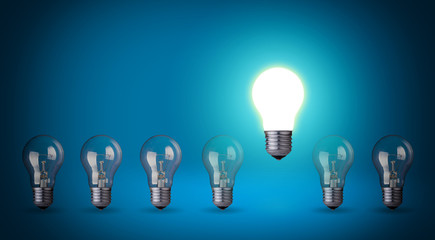 Row of light bulbs.Idea concept on blue background.