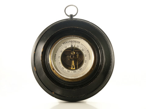 antique barometer isolated on a white background