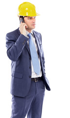 Portrait of a young engineer talking on the phone