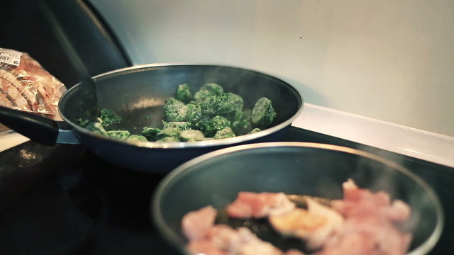 Frying spinach on frying pan