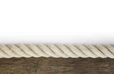 Obraz premium Starkes Tau auf verwittertem Holz