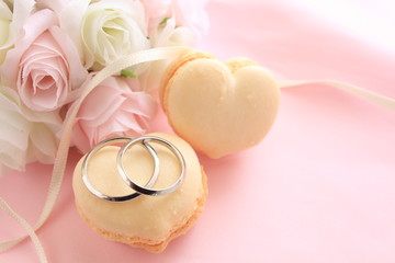 heart shape macaroon with flower bouquet for wedding background 