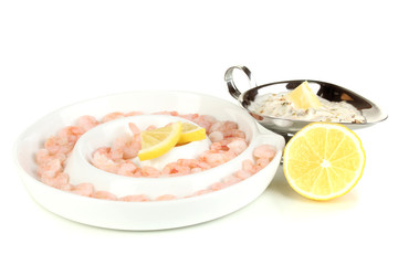 Shrimps with lemon on plate isolated on white