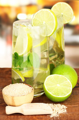 Glasses of cocktail with lime and mint