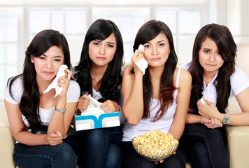 group of teenager watching sad Movie
