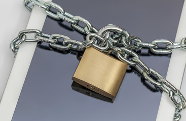 tablet computer with chain and padlock