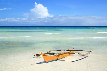 Picturesque seascape with boat. Anda beach, Philippines