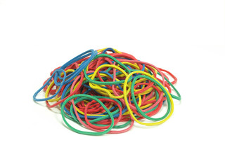 pile of colorful rubber bands on white background