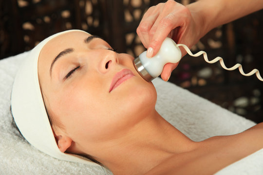 Young Woman Receiving Massage  - Microdermabrasion