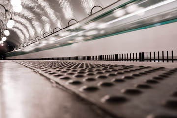 Parisian metro in motion blur at the Cité Station