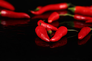 Red chilli peppers on the Cutting Board