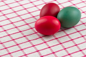 easter eggs an red checked texile