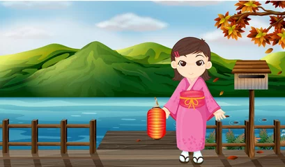 Poster Een meisje in een kimono met een lantaarn naast een houten mailbo © GraphicsRF