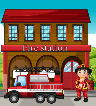 A fireman with a fire truck in a fire station