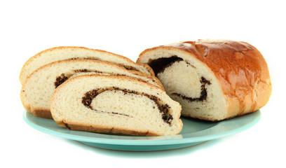 Loaf with poppy seeds on color plate, isolated on white