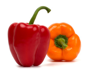Two sweet red peppers isolated on white