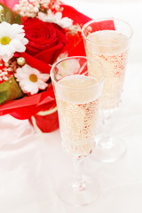 champagne with wedding flowers