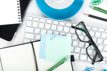 Office supplies, glasses and computed keyboard