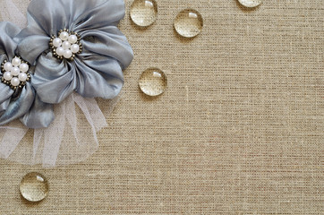 Background with hand-made flowers in the corner