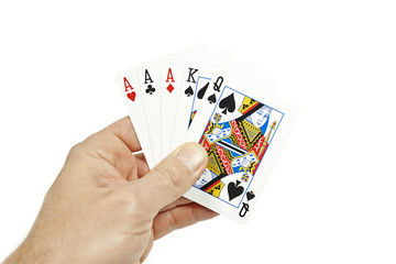 Poker player holding three of a kind