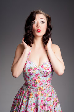 Fifties retro lady blowing a kiss