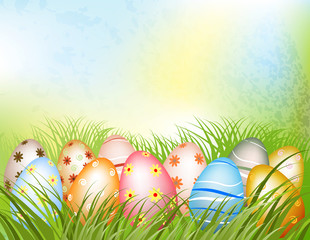 decorated easter eggs in grass