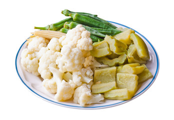 Thai style boiled vegetables, isolated on white background.