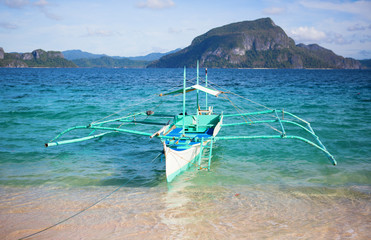 Outrigger boat near the shore on Palawan, Philippines