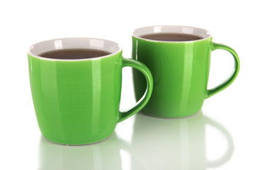Cups of tea isolated on white