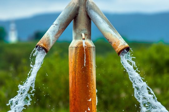 Water Flowing From Outdoor Tap