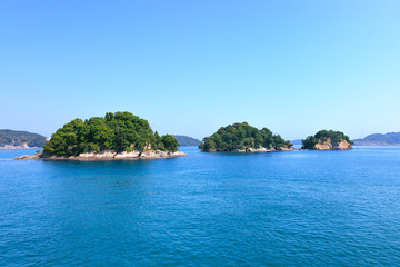 Small islands on sea and blue sky. Toba bay, Japan.