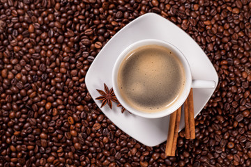 High angle view of a coffee cup with cinnamon
