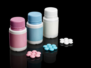 Plastic small bottles with pills.