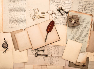 open book, vintage accessories, old letters and documents