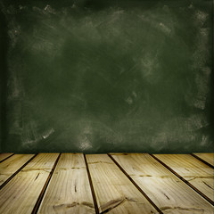 Wooden floor boards and green chalkboard background