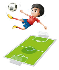 Fototapeta premium A boy kicking the ball