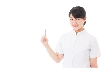 a young asian nurse showing on white background