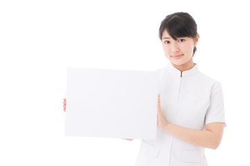 a young asian nurse on white background