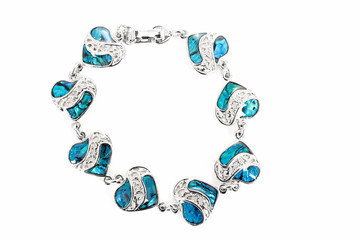 female bracelet with hearts isolated on white © ArtushFoto