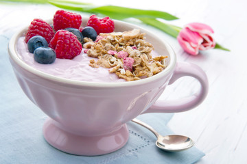 Breakfast with a pink tulip
