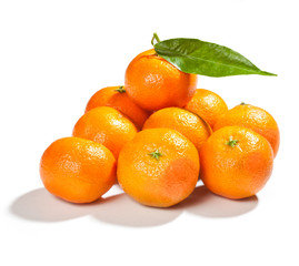 fresh mandarins with leaf isolated on white background