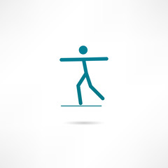 A man balancing on a tightrope