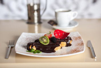 chocolate eclairs with coffee