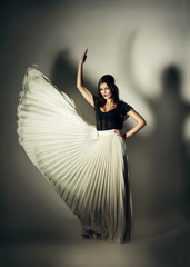 Fototapeta premium mystic woman with flying skirt