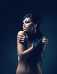 Fototapeta premium naked woman in dark room